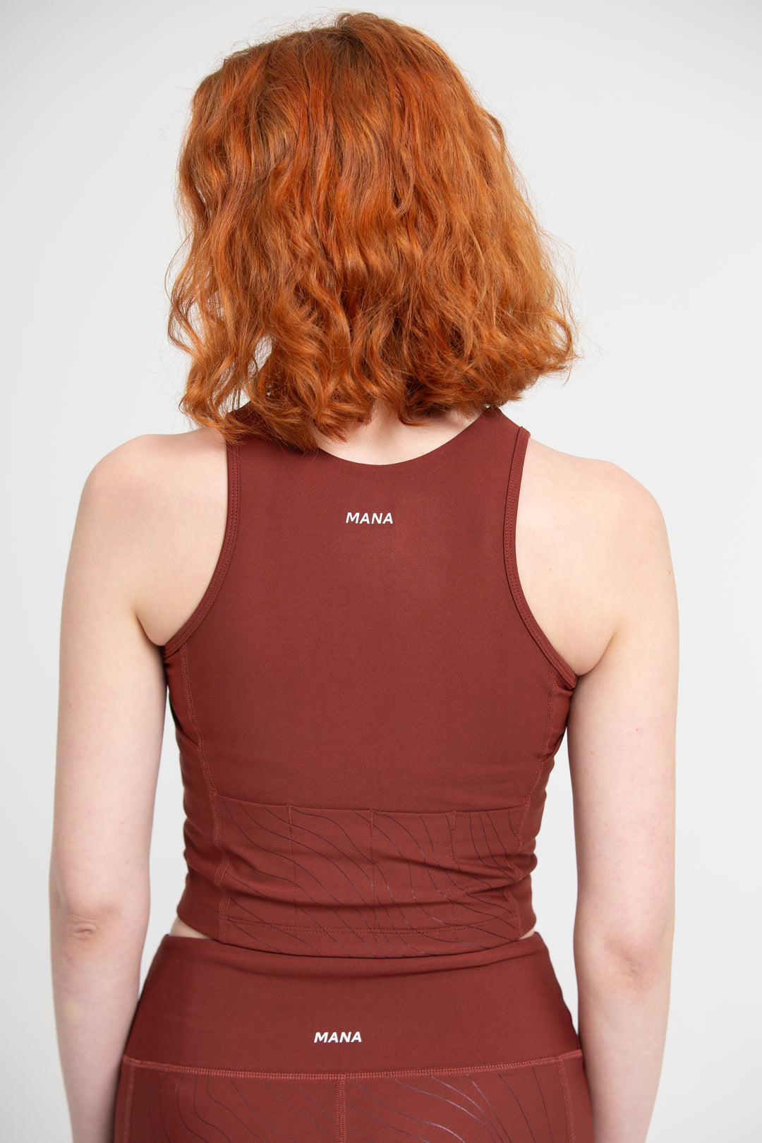 WOMEN'S PERFORMANCE CROP VEST TRACK RED